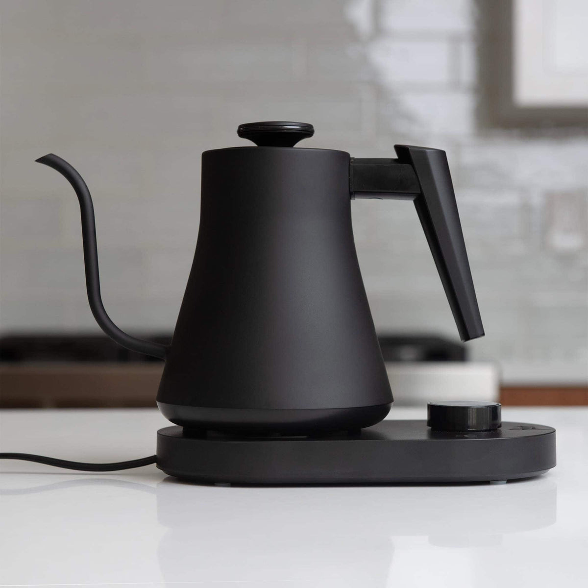 Flair digital gooseneck kettle on a white countertop