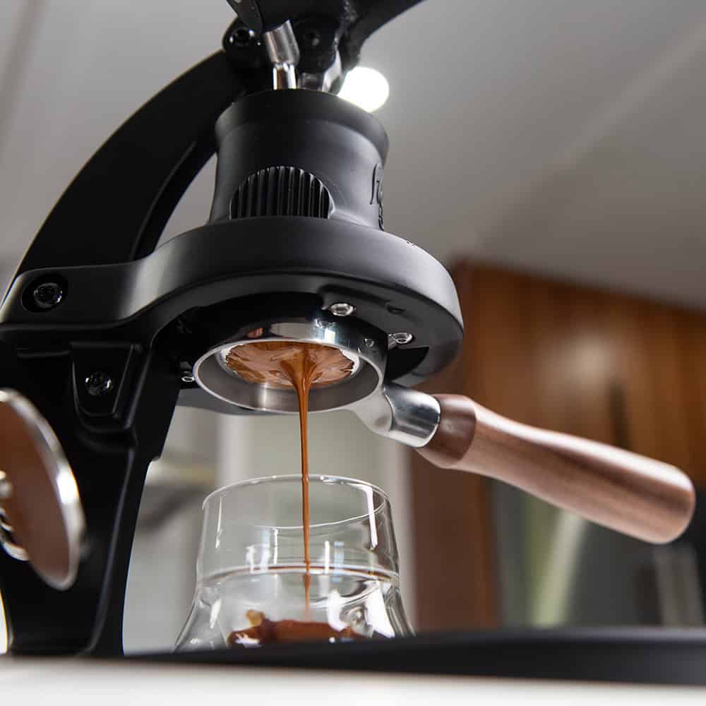 Bottom view of the Flair 58 Plus 2 brewing espresso.
