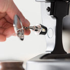 Adding the articulating shot mirror onto the base of a Flair manual espresso maker