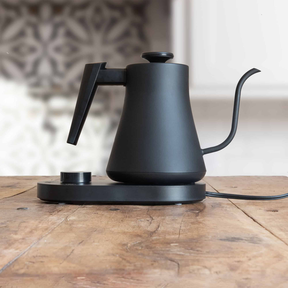 Flair Kettle on a wooden table.