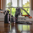 The Stovestop Steam Kit for the Flair 49 PRO manual espresso maker includes the Flair Wizard Steamer and the Flair Milk Pitcher.