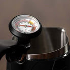 Flair analog milk steaming thermometer in the Flair Milk Pitcher.