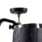Flair digital thermometer nested in the Flair Milk Pitcher.