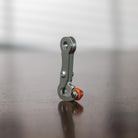 Flair 58 Joint Hook from the front on a wooden table.