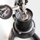 The all stainless steel brewing system of the Flair 49 PRO. Showing a stainless steel piston stem and plunger.