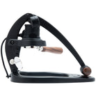 Flair 58 Plus 2 black manual coffee press with wooden handle on a white background