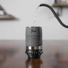 The thin heat efficient cylinder of the Flair Classic with boiling water being poured inside.