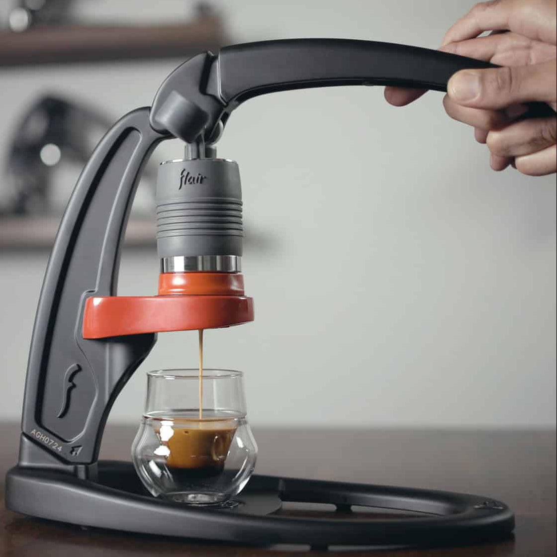 Flair Classic manual espresso maker brew espresso with the red flow control portafilter.