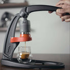 Flair Classic manual espresso maker brew espresso with the red flow control portafilter.